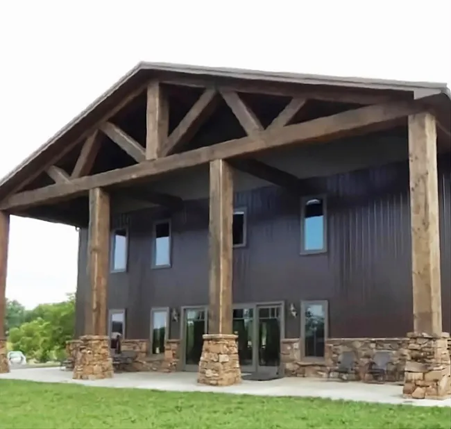 Metal building with stone front