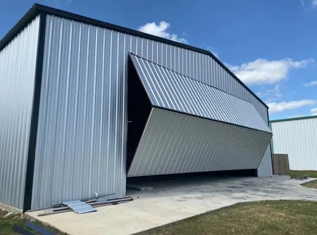 Metal building with large folding door